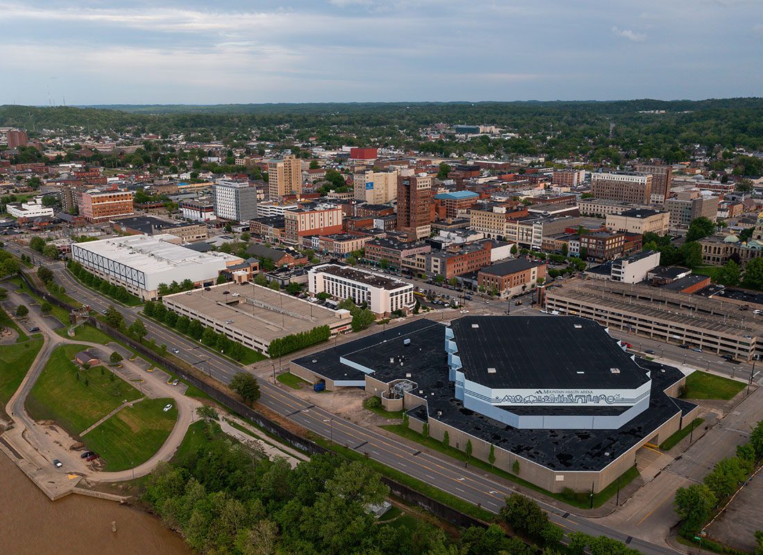 Huntington, WV - Aerial View of Large Commercial Buildings and Apartments in Downtown Huntington West Virginia on a Cloudy Day