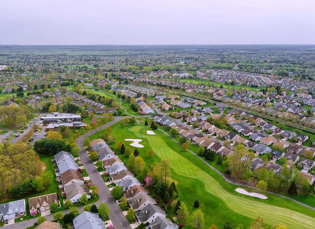 Proctorville, OH - Aerial View of Small Residential Communities with Homes Surrounded by Green Foliage in the Small Town of Proctorville Ohio